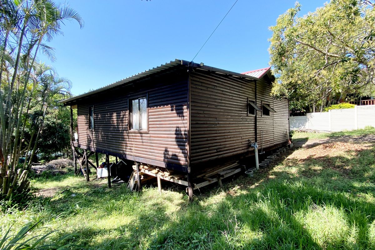 The Fixers Dream, 3 Bedroom Log Home with Expansive Yard and Endless Potential - Photo 3