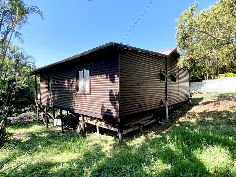 The Fixers Dream, 3 Bedroom Log Home with Expansive Yard and Endless Potential - Photo 3
