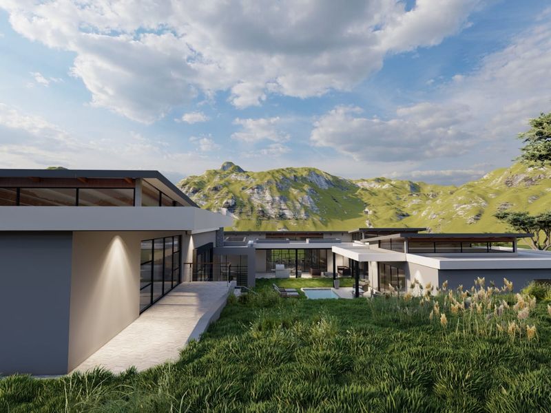 Modern architectural rear elevation featuring a swimming pool, expansive glass doors, and a paved patio set against a scenic mountain landscape.
