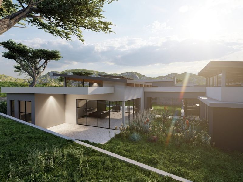 A modern architectural rear elevation featuring expansive glass sliding doors, a covered patio, and a landscaped garden set against a scenic mountain backdrop.