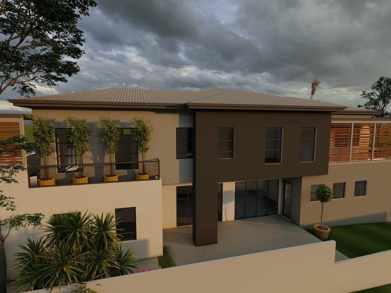 A modern two-story residential exterior featuring a balcony, timber screening, and large sliding glass doors opening onto a rear garden area.
