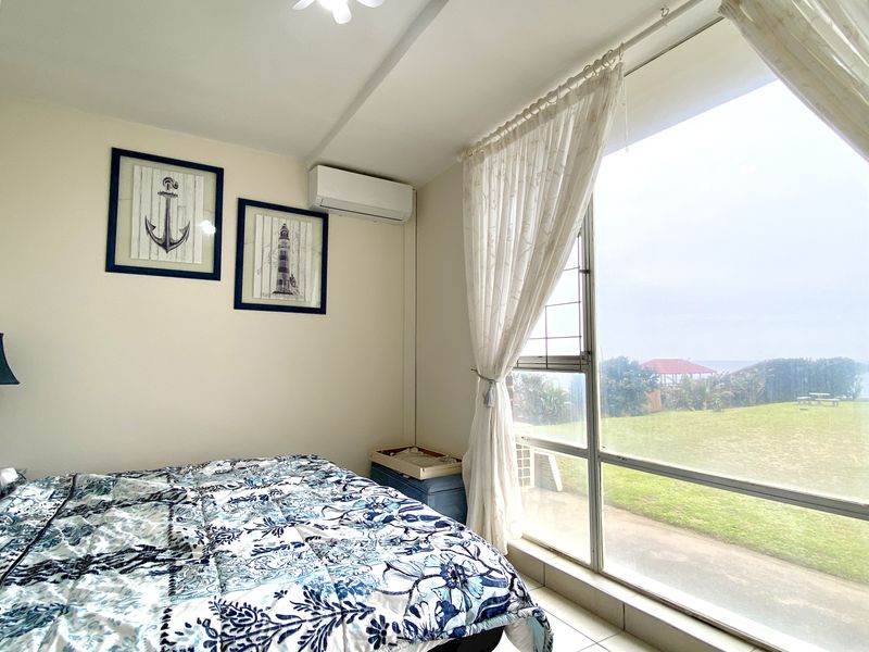 Beachfront Bliss with 2 Bedrooms Fully Furnished Coastal Luxury - Photo 6