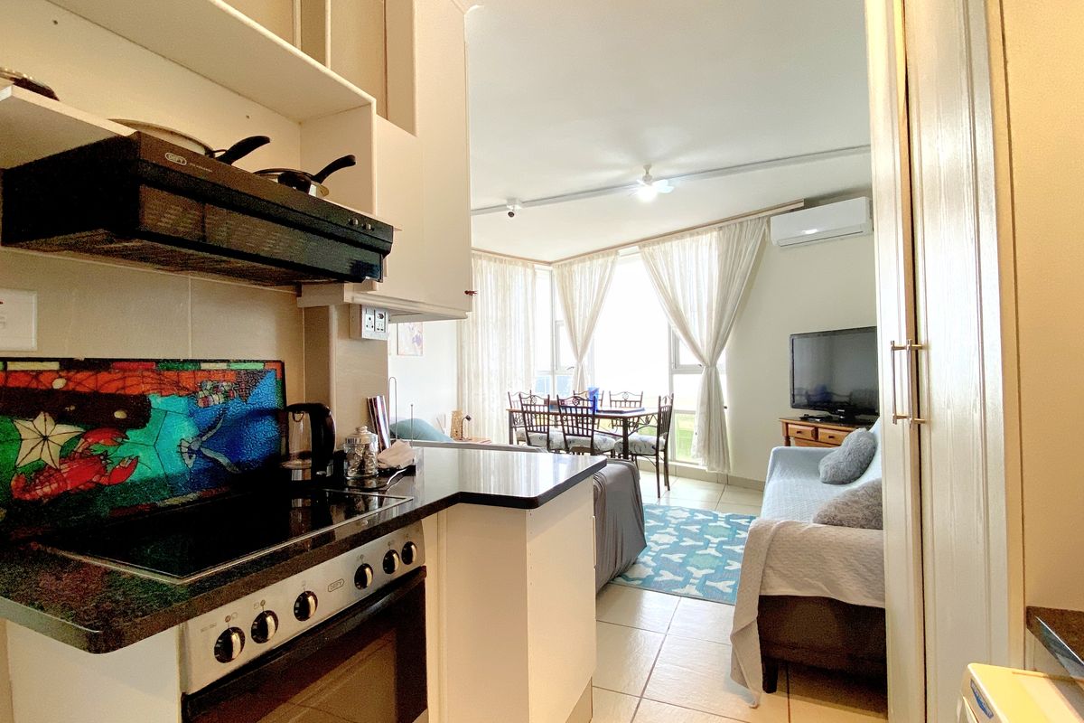 Beachfront Bliss with 2 Bedrooms Fully Furnished Coastal Luxury - Photo 3