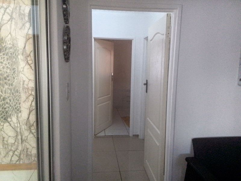 Charming 2-Bedroom Home with Spacious Yard and Built-in Carport! - Photo 8