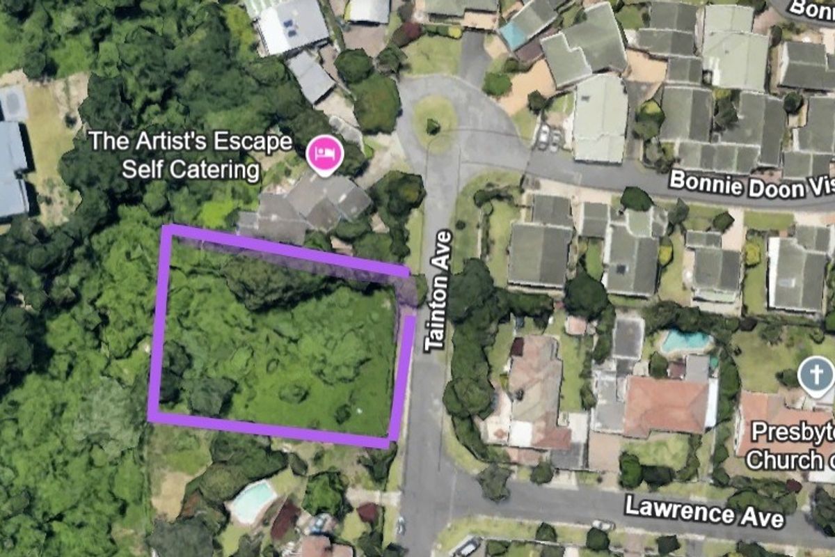 Aerial view of a vacant residential plot located on Tainton Avenue, surrounded by established residential properties and mature trees.