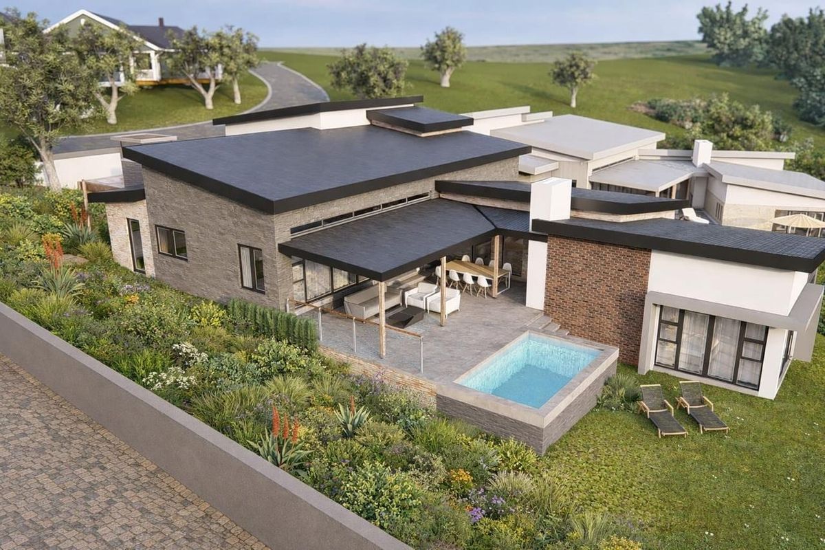 Aerial view of a modern residential property featuring a swimming pool, covered patio, and landscaped garden.