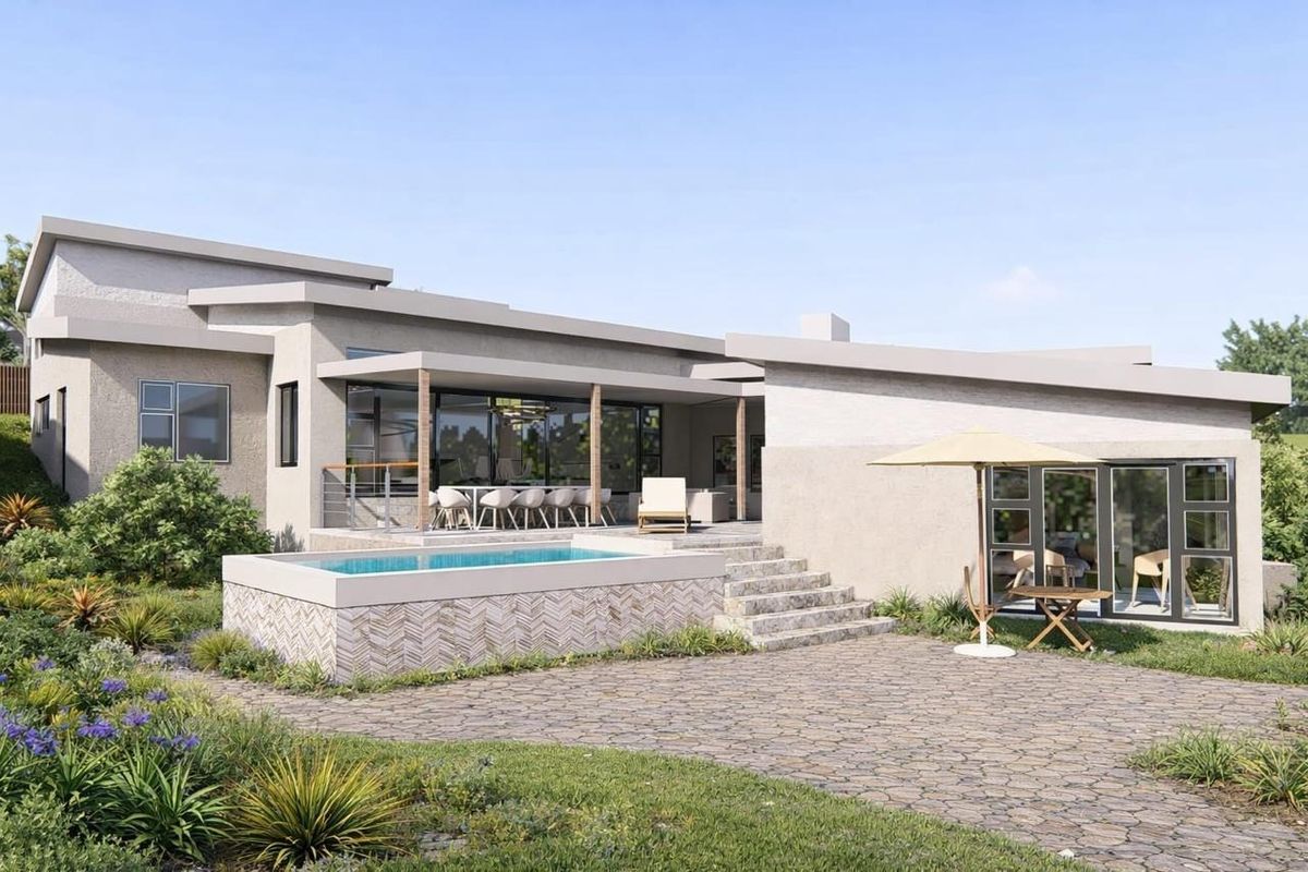 Rear view of a modern residential property featuring a raised swimming pool, stone-paved patio, covered outdoor entertainment area, and landscaped garden.