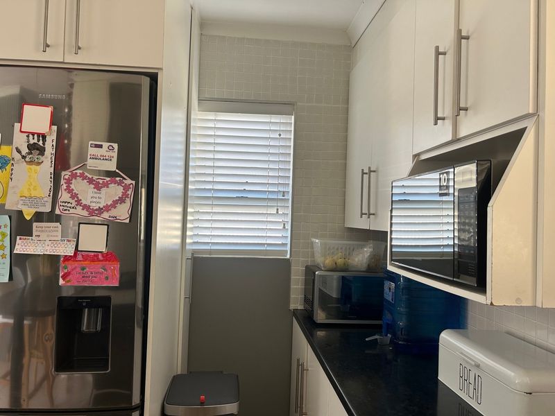 Move-in ready | Lock-up-and-go | Secure complex | Close to amenities - Photo 7