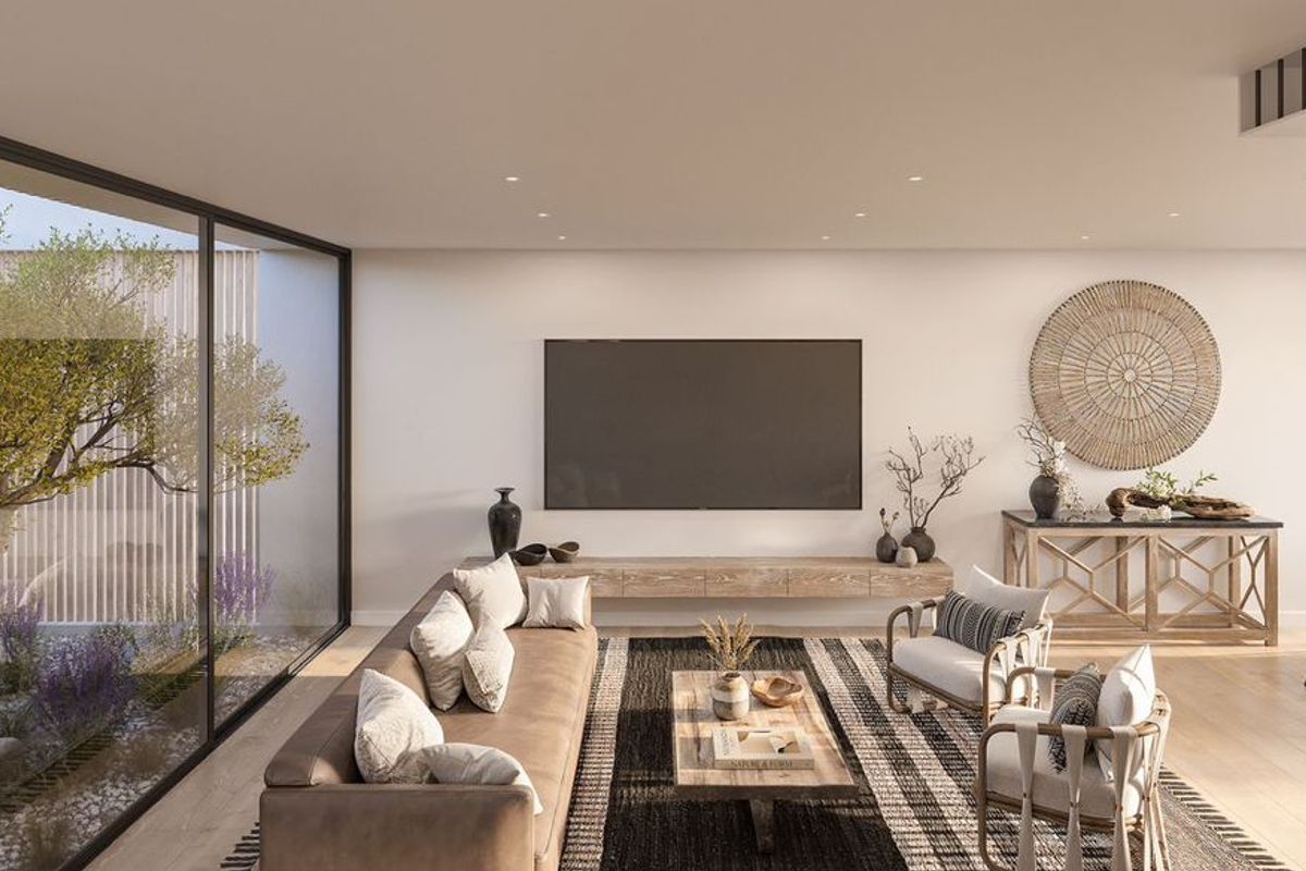 Modern open-plan living and dining area featuring floor-to-ceiling glass walls, recessed lighting, and a sleek floating media console.