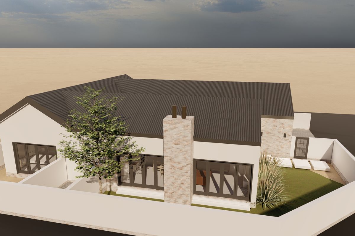 An aerial view of a modern residential property featuring a pitched roof, brick chimney, and enclosed courtyard garden area.