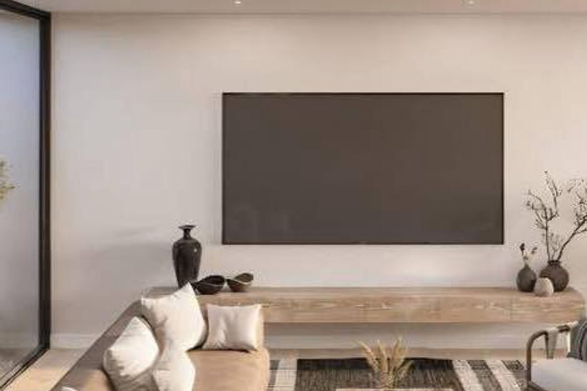 Modern living room featuring recessed downlights, a sleek floating timber media console, and large sliding glass doors providing natural light.