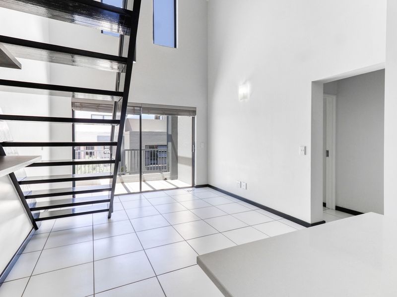 This exceptional top-floor apartment in the heart of Paulshof - Photo 5