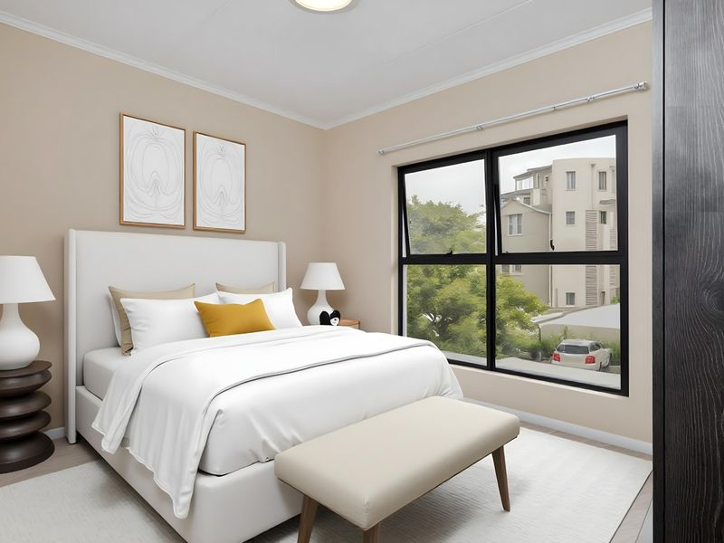 A well-maintained bedroom featuring neutral wall tones, a large black-framed window, and built-in storage cabinetry.