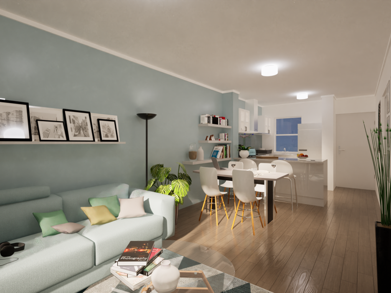 A modern open-plan living and kitchen area featuring laminate flooring, neutral wall tones, and a functional kitchen island with integrated cabinetry.