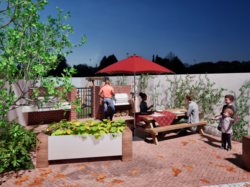 A well-maintained rear patio area featuring a brick built-in braai, paved flooring, and integrated planters, ideal for outdoor entertaining.