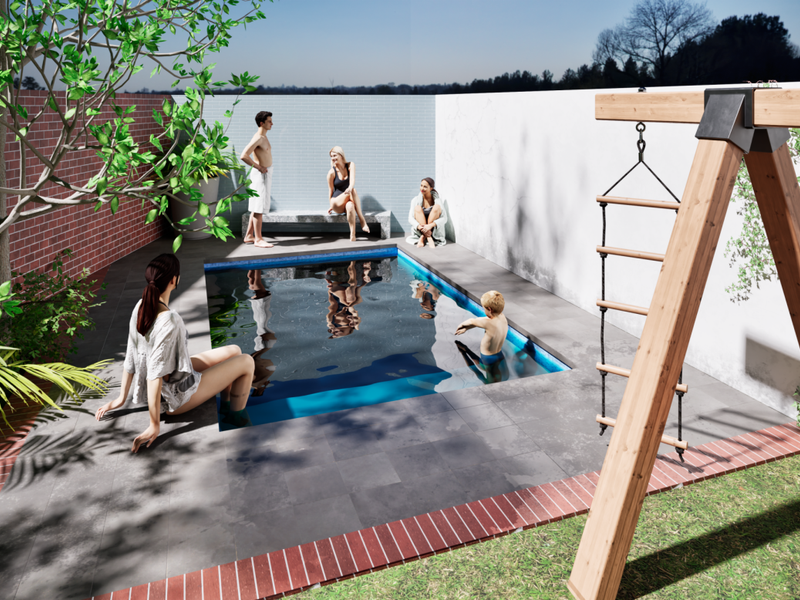 A modern outdoor pool area featuring a compact swimming pool, stone paving, and a brick boundary wall, designed for leisure and recreation.