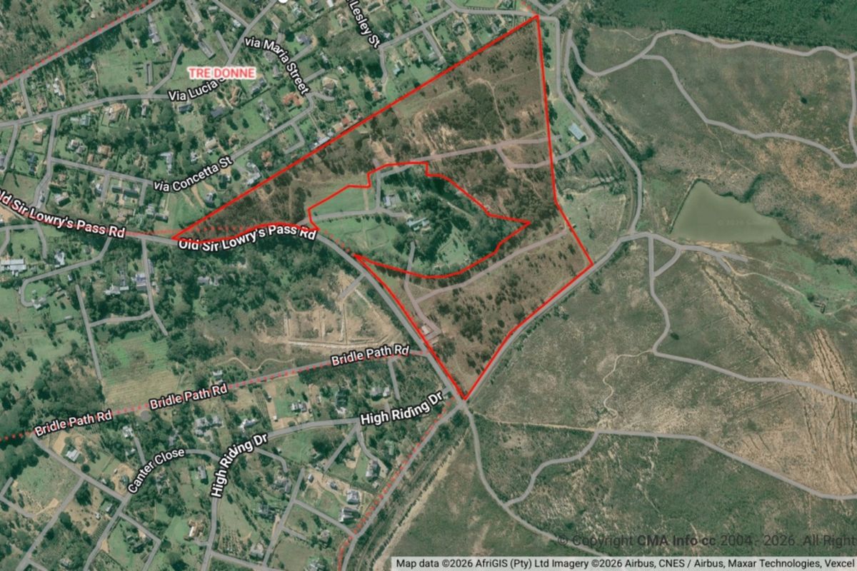 An aerial view showing the boundaries of the vacant residential land plot with surrounding road access and local infrastructure.