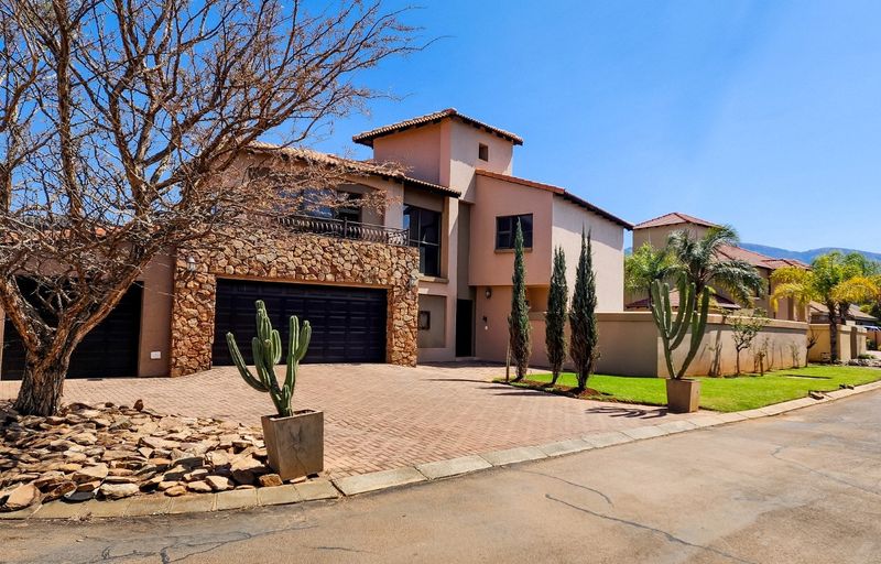 Spacious Family Home with Generous Garden in Secure Melodie Complex
