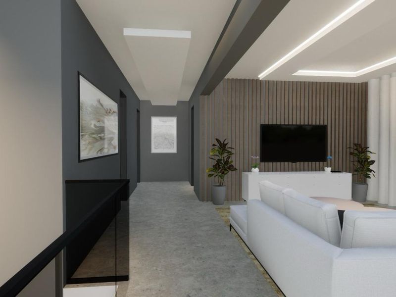 Modern living area featuring contemporary timber slat wall paneling, recessed ceiling lighting, and polished concrete flooring in an open-plan layout.