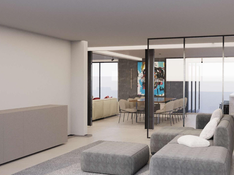 Modern open-plan living and dining area featuring a sleek glass partition, marble kitchen island, and contemporary tiled flooring.