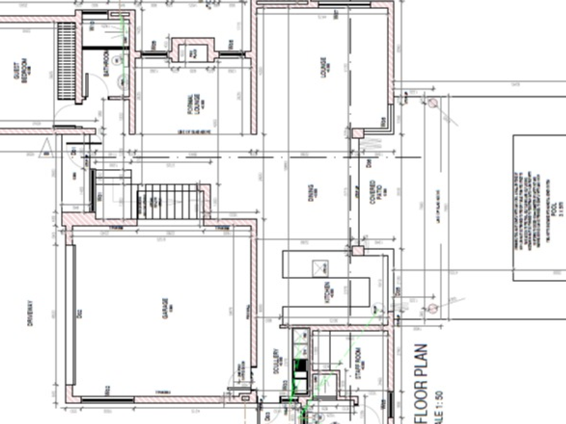 Architectural floor plan detailing the layout of the residential property, including living areas, garage, kitchen, and outdoor pool space.