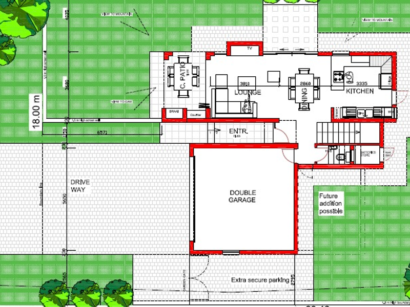 A detailed architectural floor plan showing the layout of a house including a double garage, open-plan living areas, kitchen, and outdoor patio space.