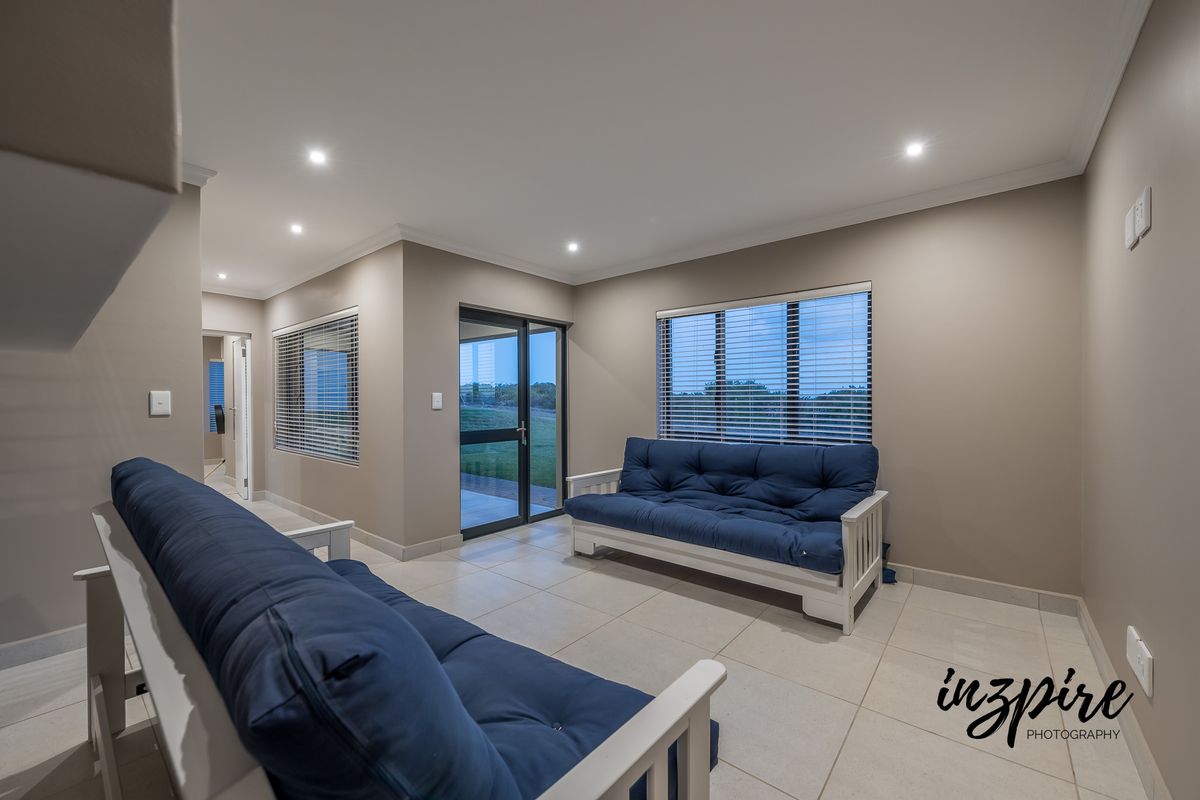 Modern 3-Bedroom Home with Breathtaking Views in Hartland Lifestyle Estate - Photo 4