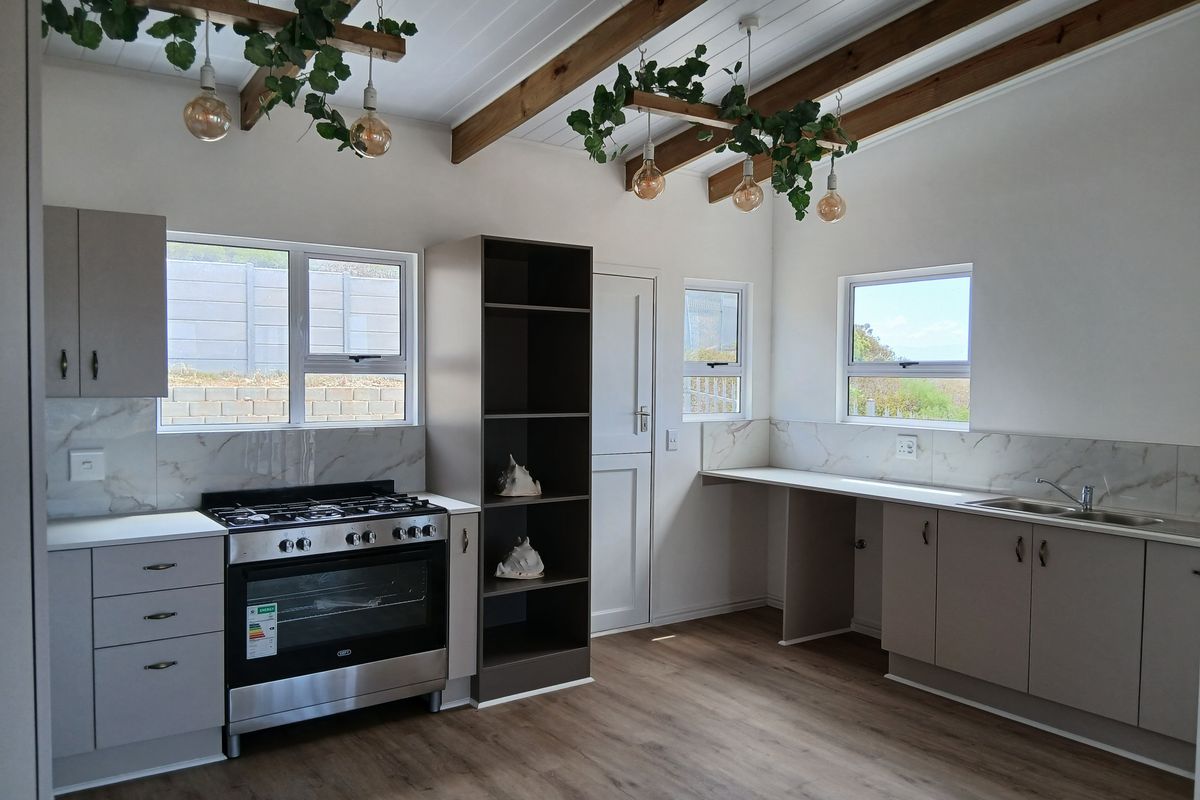 Versatile Coastal Home with Income Potential & Space to Grow - Photo 3