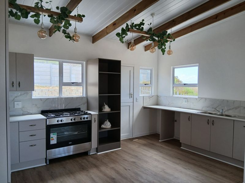 Versatile Coastal Home with Income Potential & Space to Grow - Photo 3