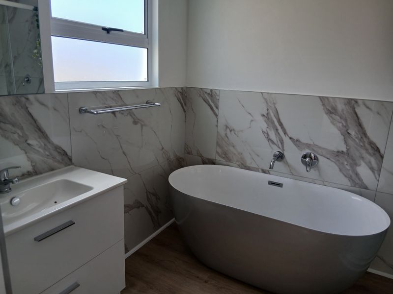 Versatile Coastal Home with Income Potential & Space to Grow - Photo 10