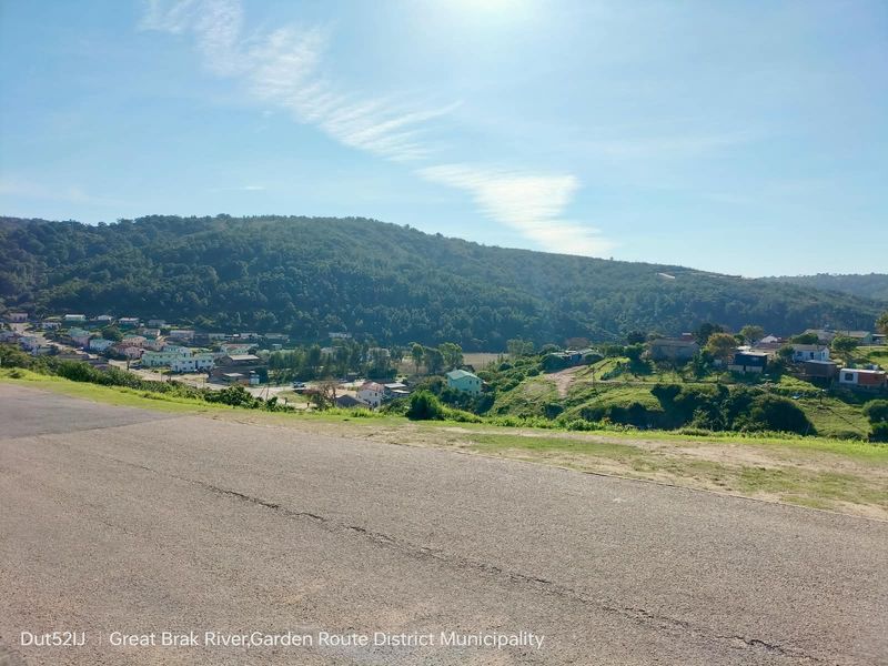 A scenic elevated view overlooking the surrounding landscape, hills, and residential area in the Great Brak River region.