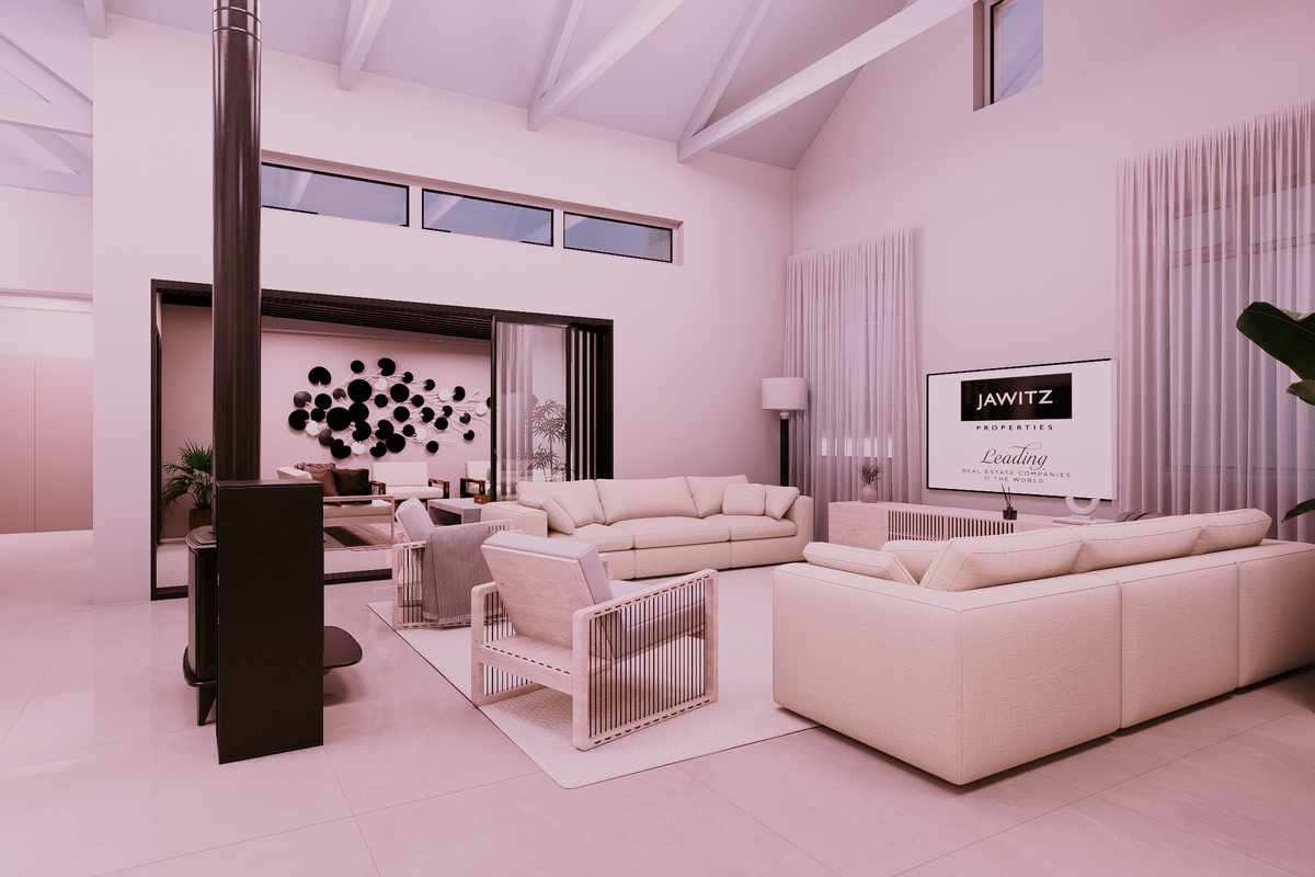 Spacious living room featuring a vaulted ceiling with exposed rafters, a modern freestanding fireplace, and large sliding glass doors opening to an outdoor area.