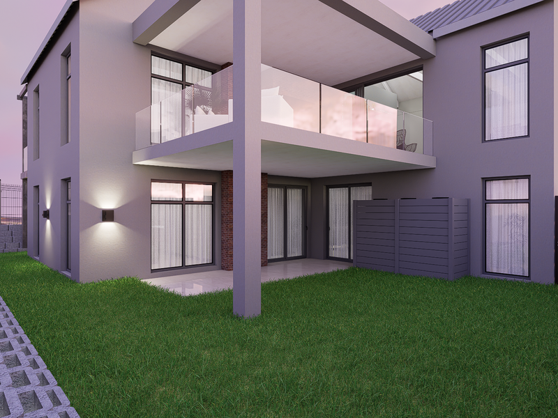 Rear view of a modern two-story house featuring a covered patio, upper balcony with glass balustrade, and a landscaped garden area.