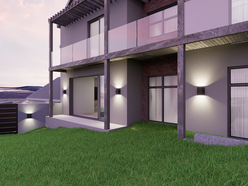 Modern rear exterior view of a two-story house featuring a glass-railed balcony, timber pergola, and sliding doors opening onto a landscaped garden area.