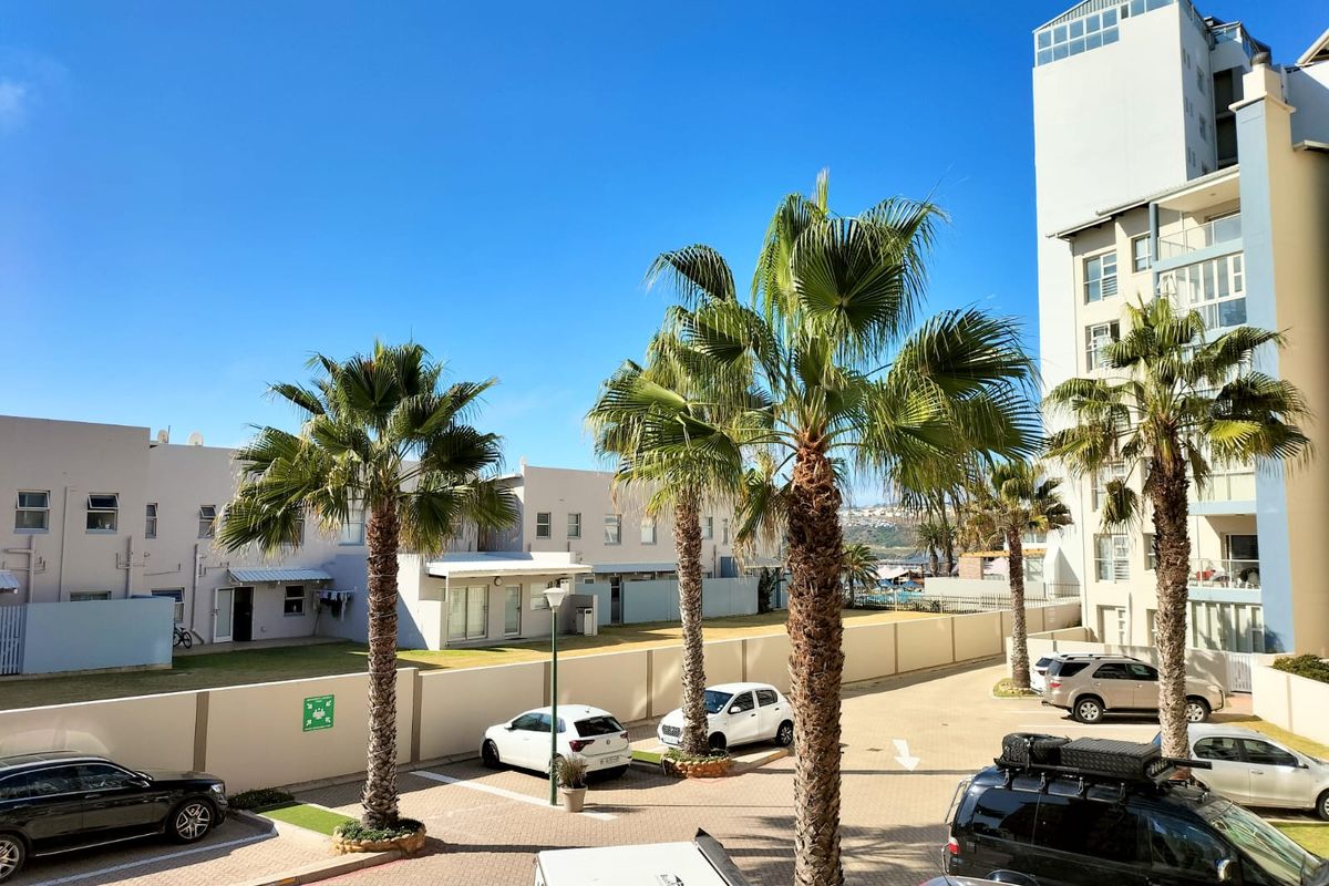 STUNNING BEACHFRONT APARTMENT IN SECURE BEACH COMPLEX - Photo 4