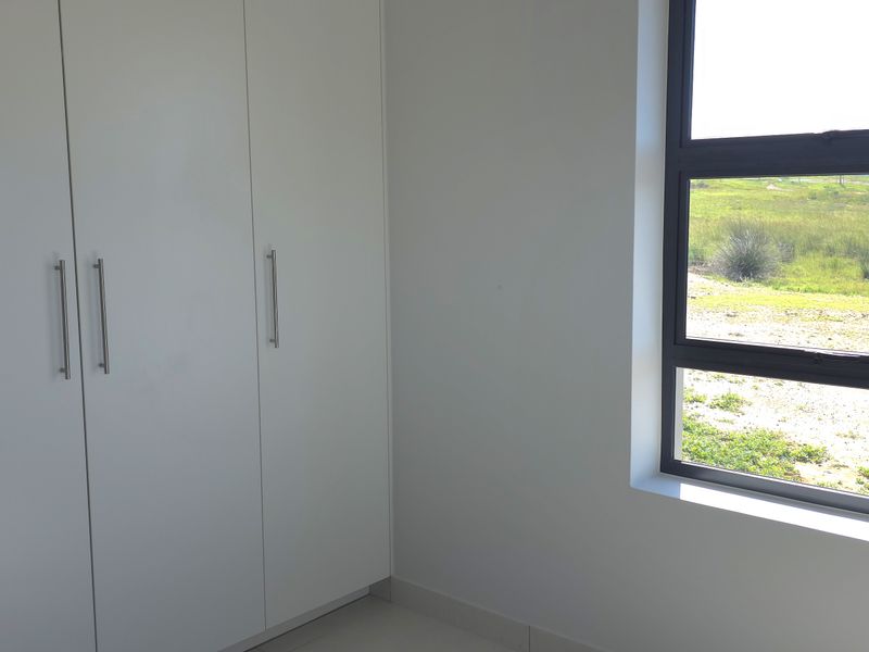 Sunny North-Facing Corner Apartment in Hartland Retirement Estate - Photo 9