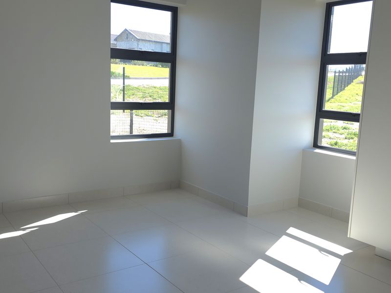 Sunny North-Facing Corner Apartment in Hartland Retirement Estate - Photo 7