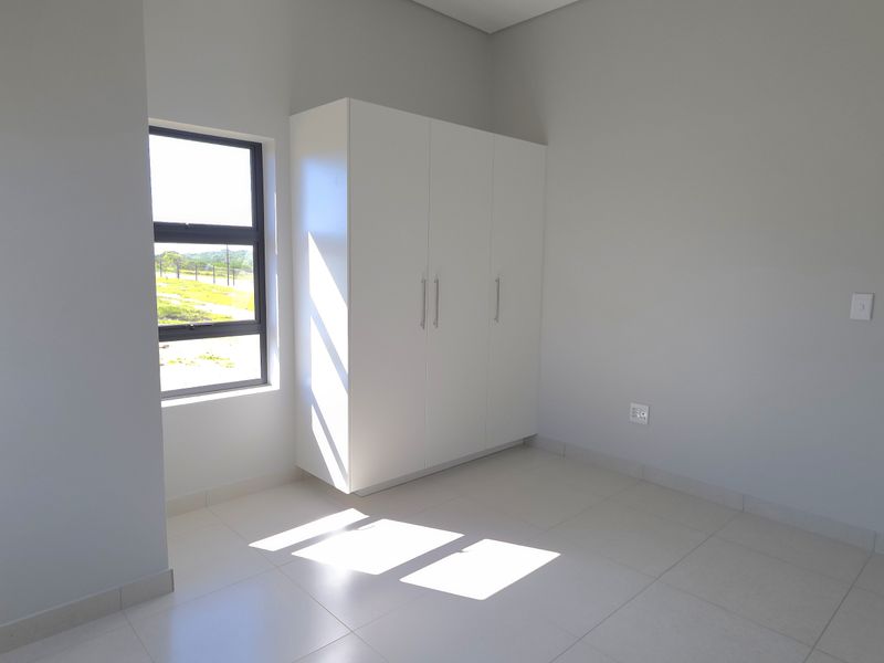 Sunny North-Facing Corner Apartment in Hartland Retirement Estate - Photo 6