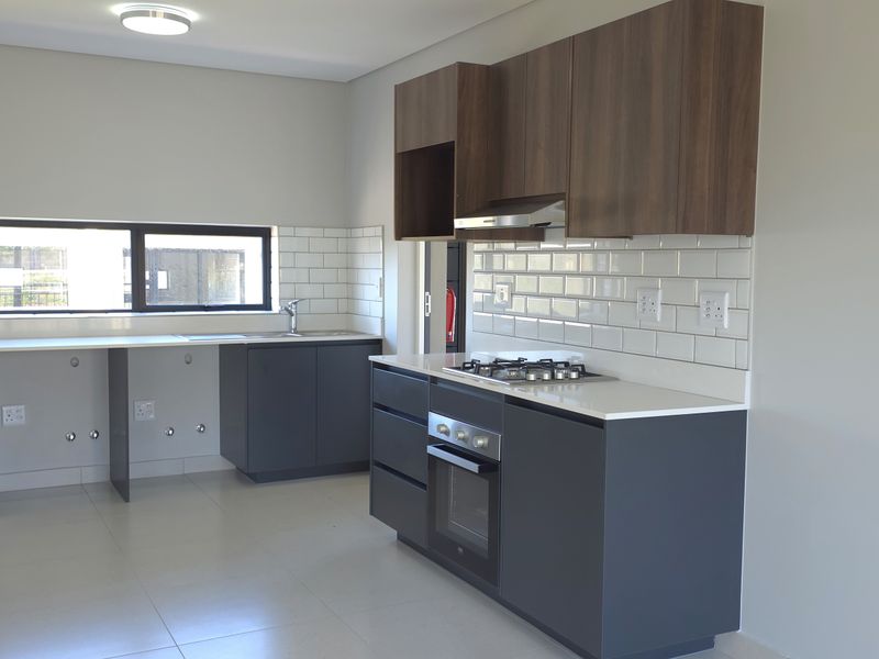 Sunny North-Facing Corner Apartment in Hartland Retirement Estate - Photo 4