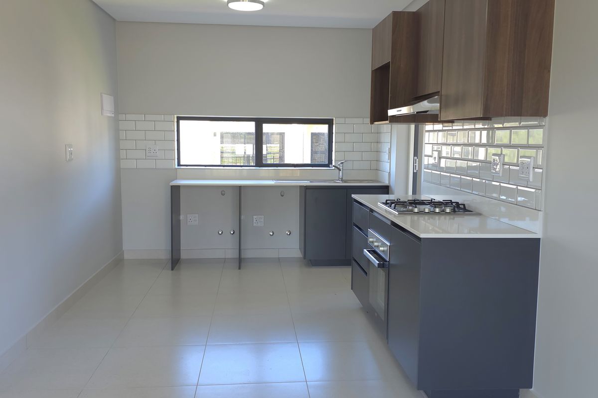 Sunny North-Facing Corner Apartment in Hartland Retirement Estate - Photo 2