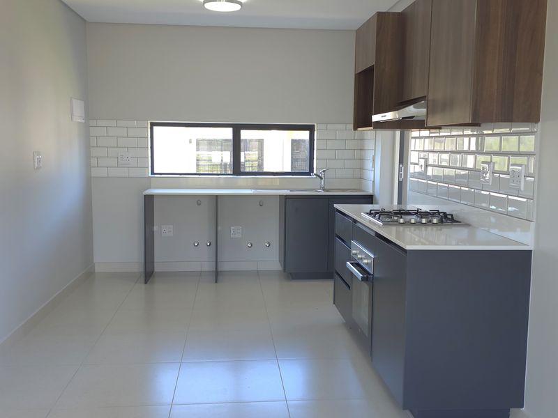 Sunny North-Facing Corner Apartment in Hartland Retirement Estate - Photo 2