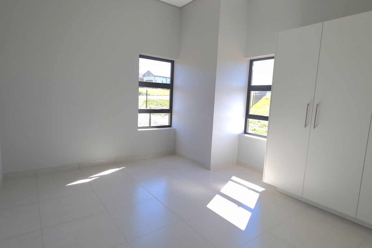 Sunny North-Facing Corner Apartment in Hartland Retirement Estate - Photo 5