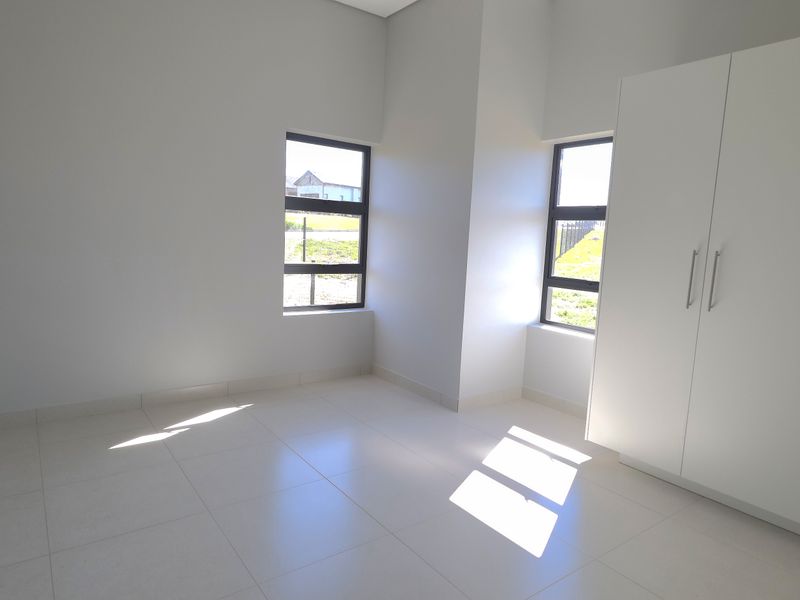 Sunny North-Facing Corner Apartment in Hartland Retirement Estate - Photo 5