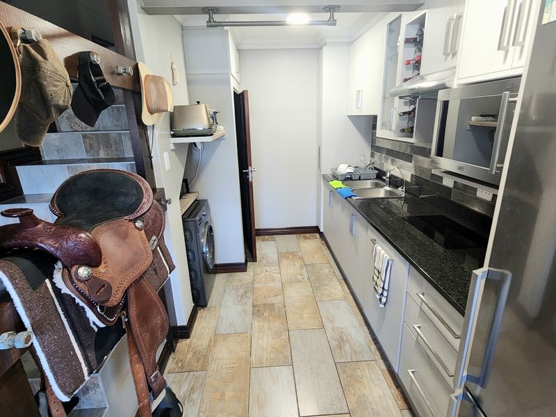 Coastal Comfort, Secure Living, and Excellent Rental Potential - Photo 10