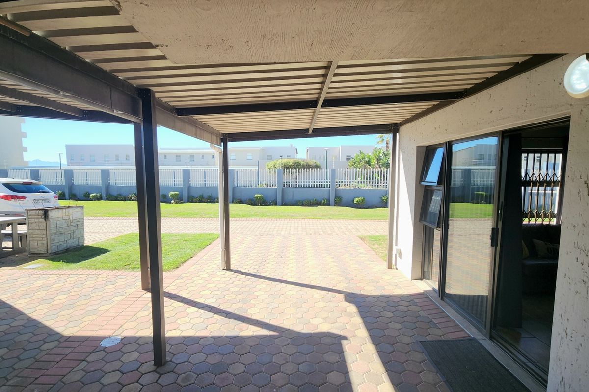 Coastal Comfort, Secure Living, and Excellent Rental Potential - Photo 3