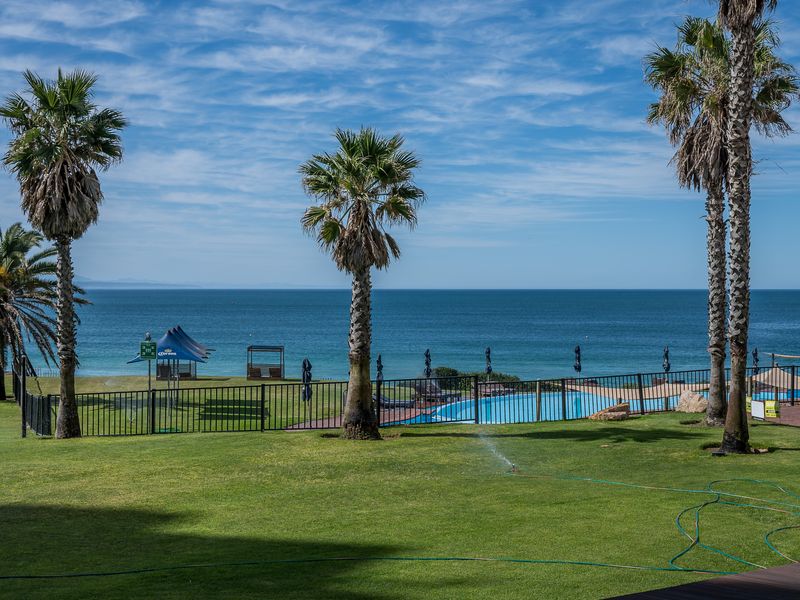 Elevated Oceanfront Living | 2‐Bedroom Apartment at Diaz Beach - Photo 2