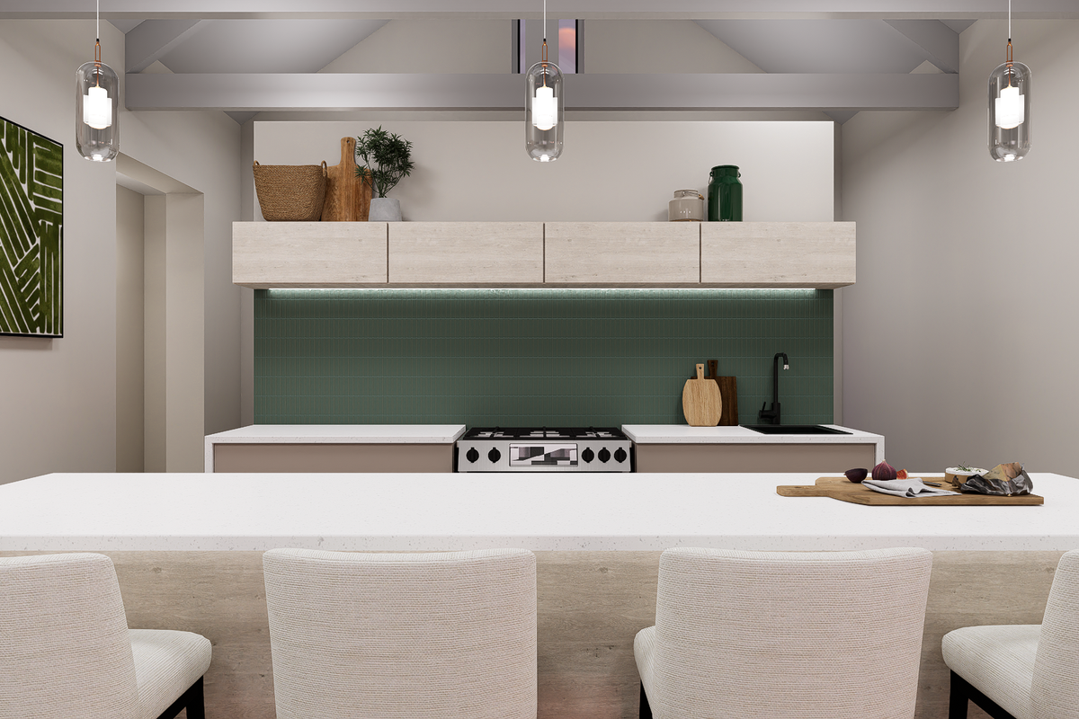 Modern kitchen featuring a central island with stone countertop, integrated appliances, green tiled splashback, and exposed ceiling beams with pendant lighting.