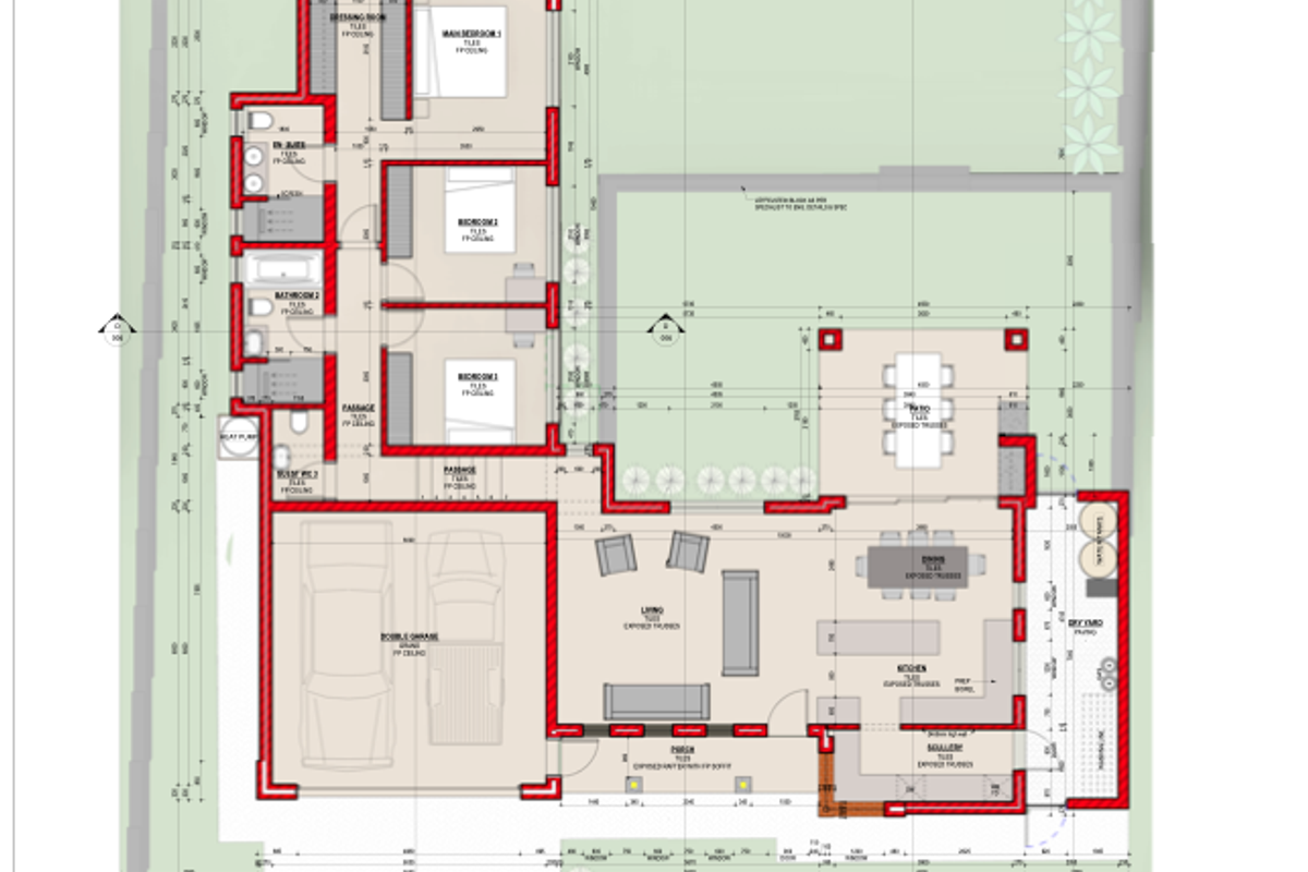 A detailed architectural floor plan showing the layout of a single-story house, including bedrooms, living areas, kitchen, garage, and outdoor patio spaces.
