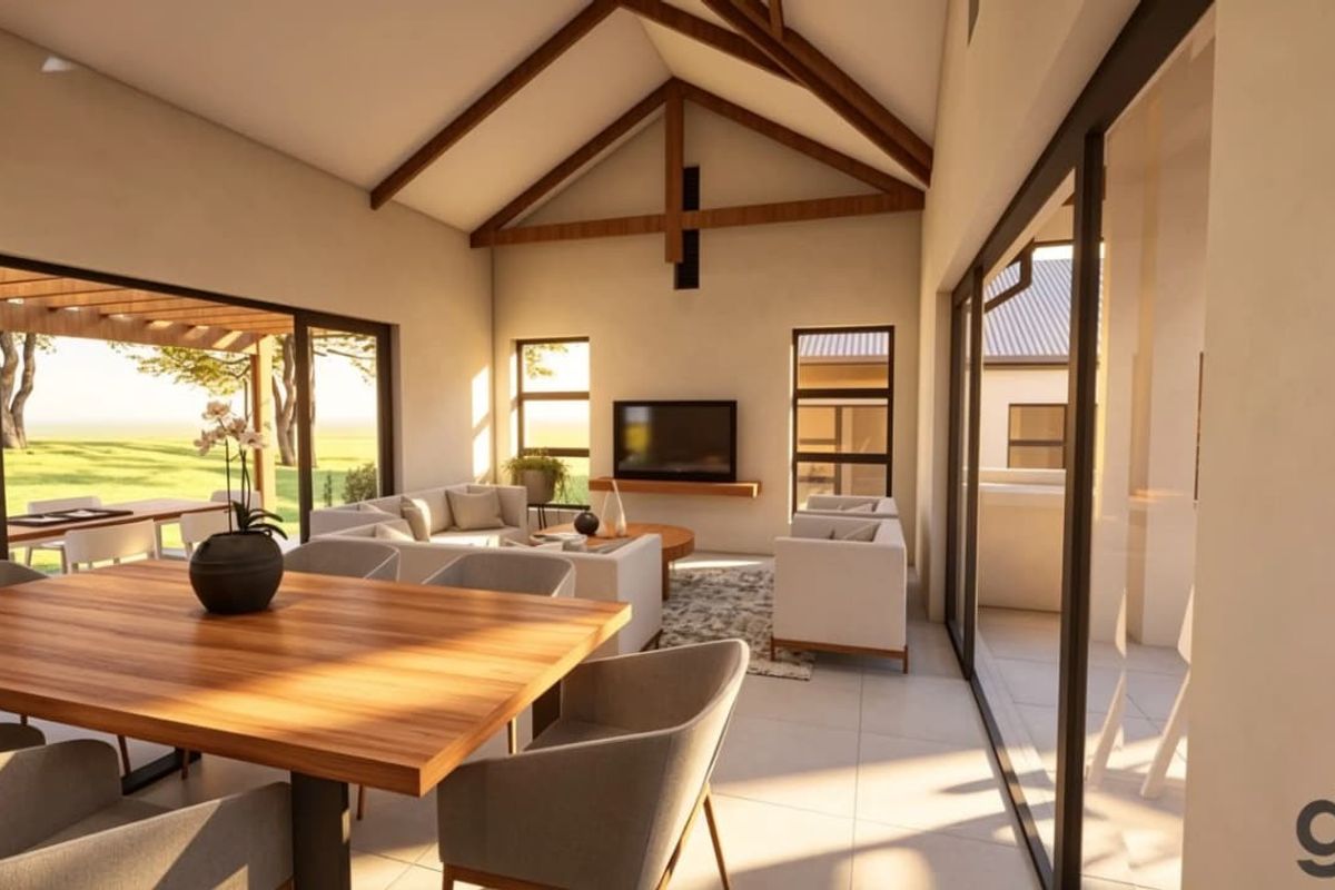 Spacious open-plan living and dining area featuring a high vaulted ceiling with exposed timber trusses and large sliding glass doors opening to the outdoors.