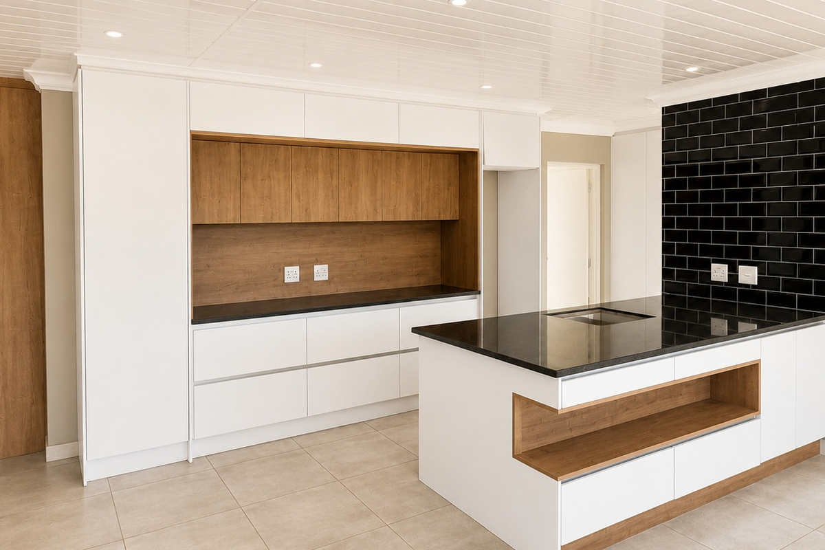 Modern kitchen featuring white and wood-tone cabinetry, a central island with stone countertops, black subway tile backsplash, and recessed ceiling lighting.